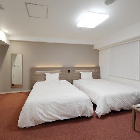 Hotel Green Core Bando Iwai Bagian luar foto