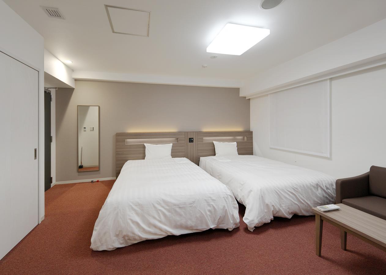 Hotel Green Core Bando Iwai Bagian luar foto