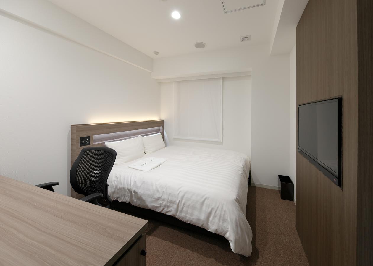 Hotel Green Core Bando Iwai Bagian luar foto
