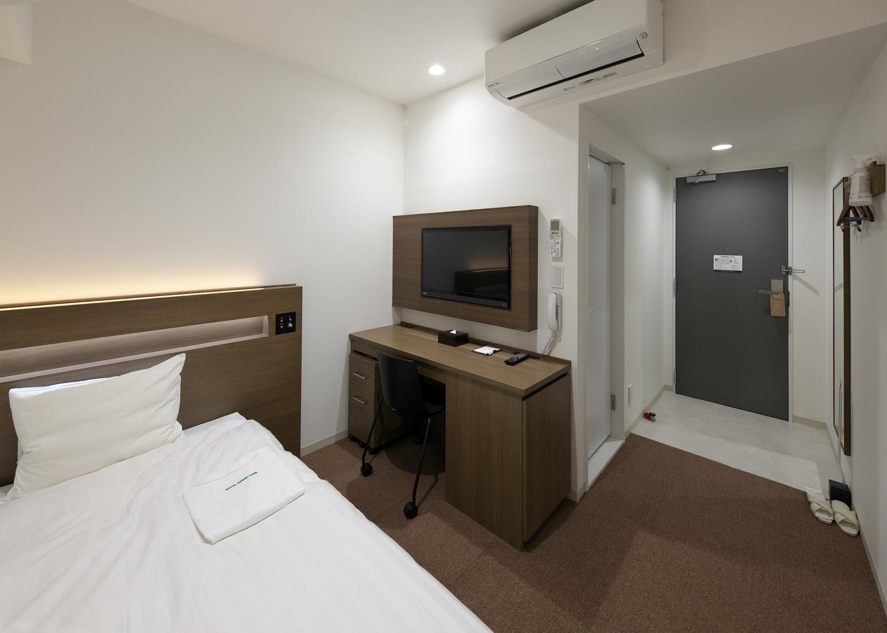 Hotel Green Core Bando Iwai Bagian luar foto