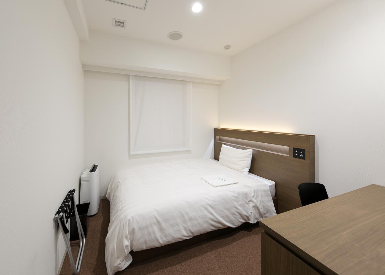 Hotel Green Core Bando Iwai Bagian luar foto