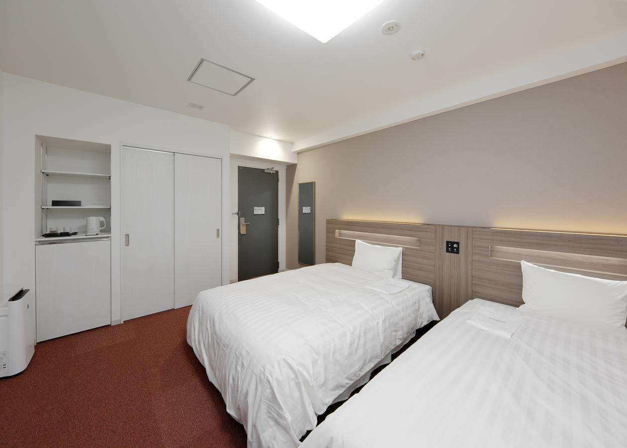 Hotel Green Core Bando Iwai Bagian luar foto