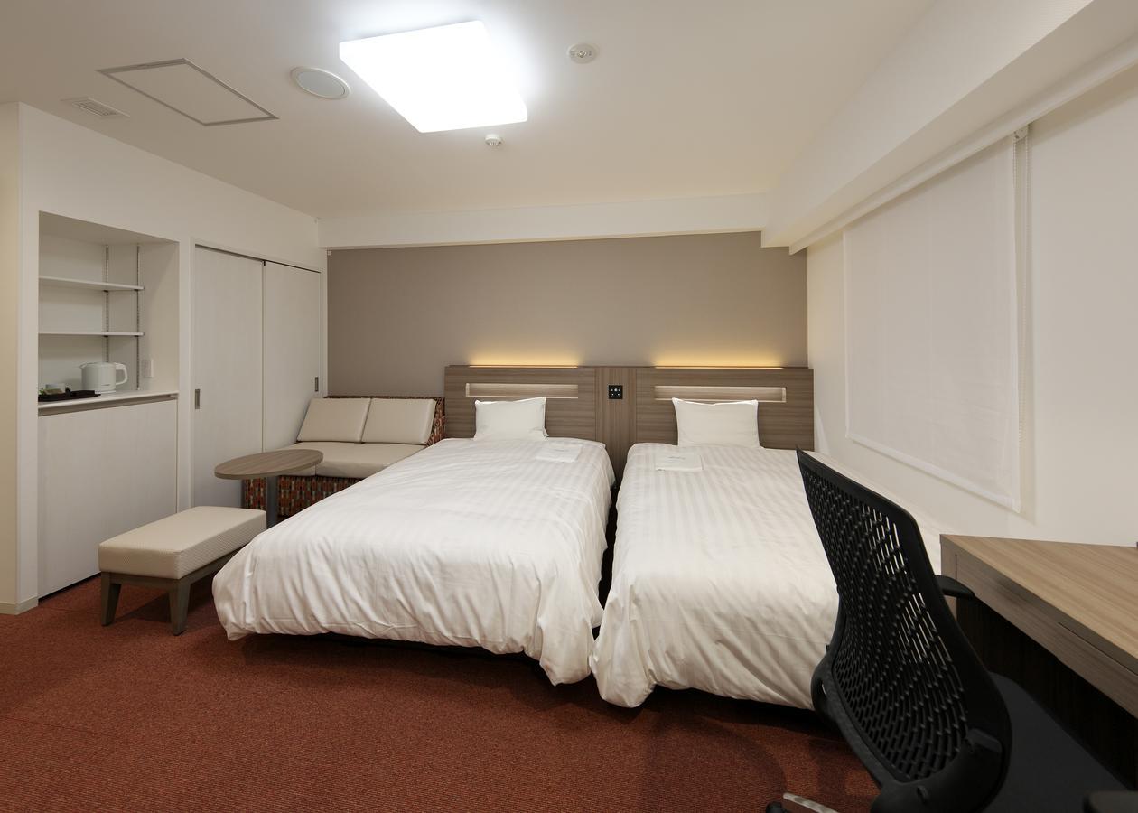 Hotel Green Core Bando Iwai Bagian luar foto
